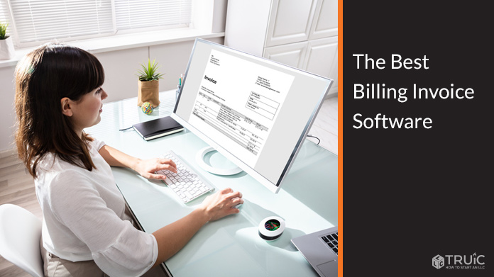 A small business owner using billing and invoice software.