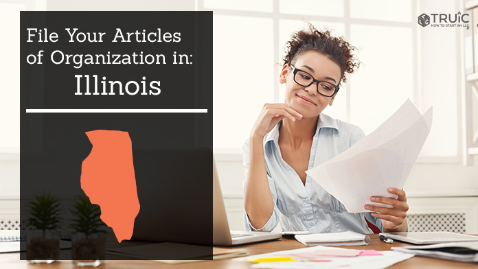 Woman smiling while looking at her articles of organization for Illinois.