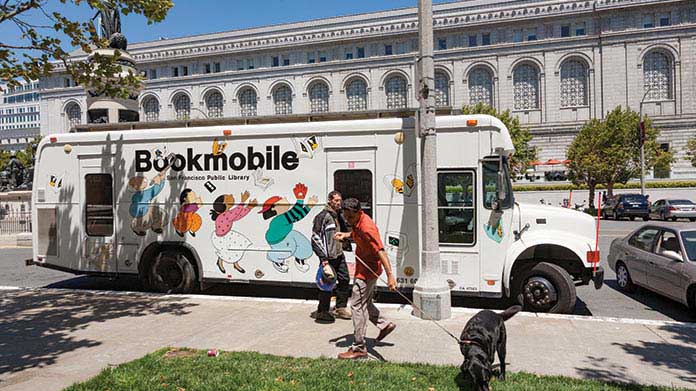 A large bus with Bookmobile printed on the side.