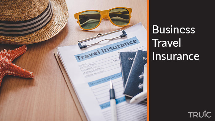 A clipboard with "travel insurance" on it.