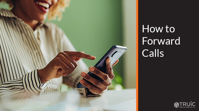 Woman learning how to forward calls with call forwarding.