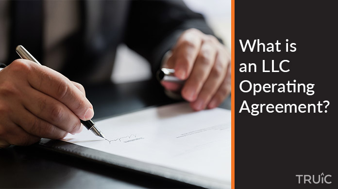 Business owner signing an LLC operating agreement