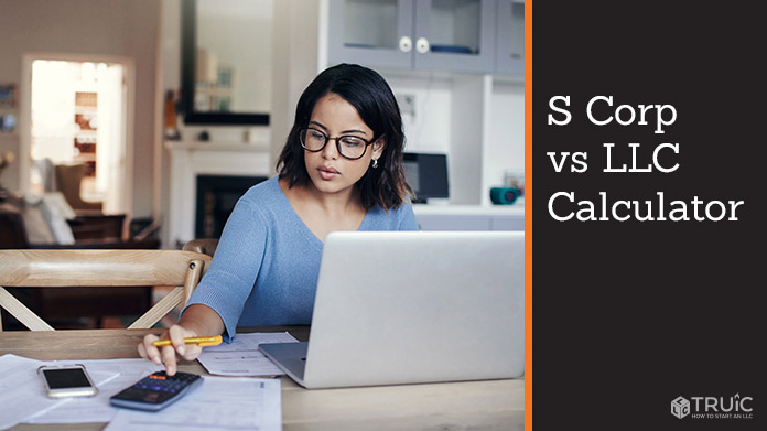 Woman working at her desk on an S corp Tax calculator to find S corp vs LLC savings. 