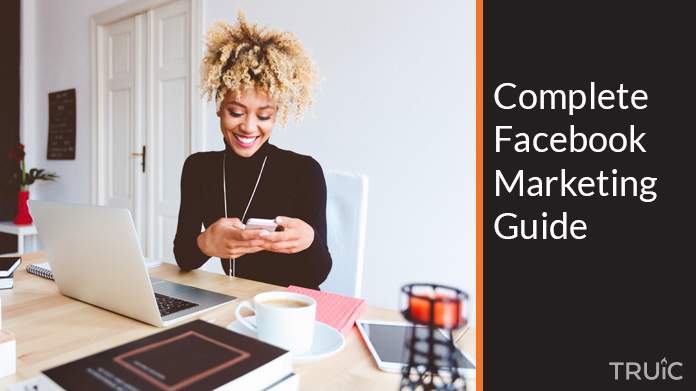 Woman looking at a complete Facebook marketing guide.
